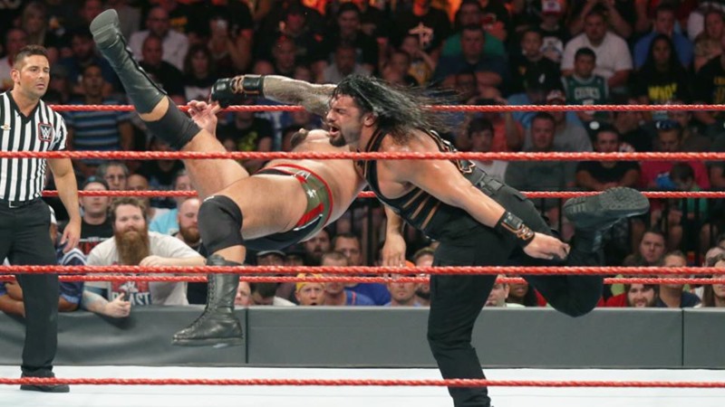 Roman Reigns, demonstrating his devastating Body Odour punch