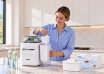 Mom installs replacement water filter on Papablic SafeguardPlus P8Plus baby bottle washer system for cleaner baby bottle washing and less limescale