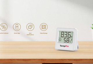 TempPro hygrometer on a wooden tabletop displaying temperature and relative humidity
