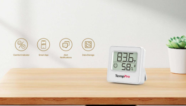 TempPro hygrometer on a wooden tabletop displaying temperature and relative humidity